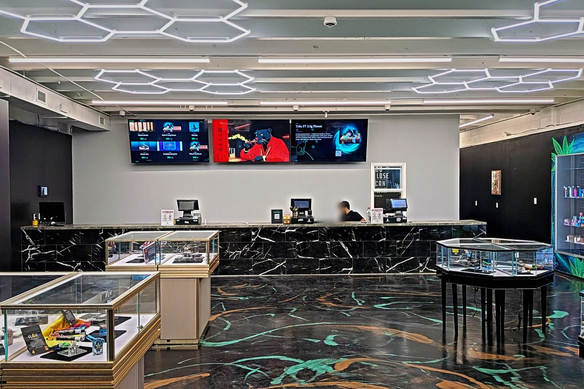 Marble service counter with POS stations and digital menu boards
