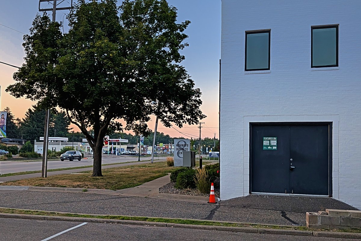 The building on Old Highway 8 at dusk